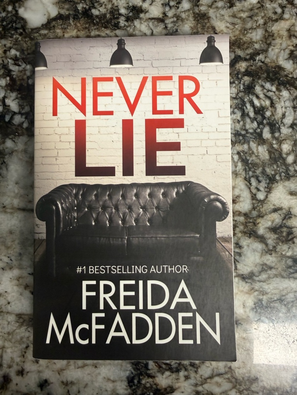 Never Lie by - Black Cover Paperback
